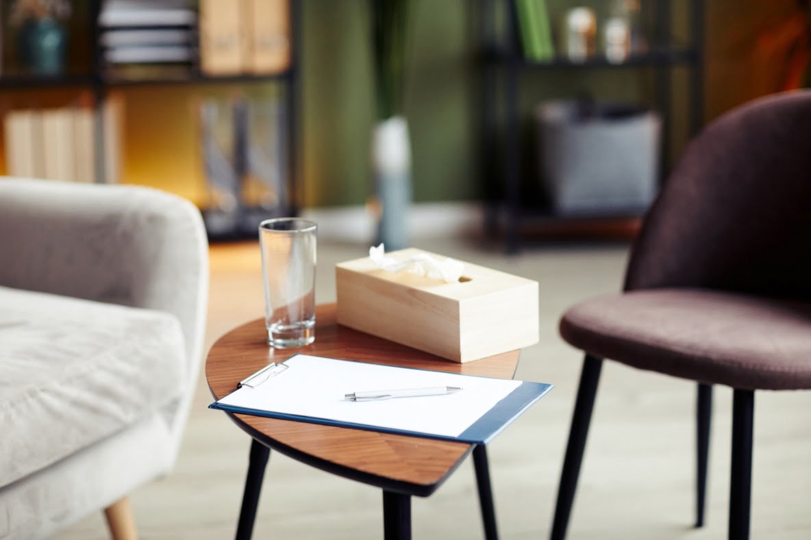 A picture containing indoor, floor, chair, room Description automatically generated